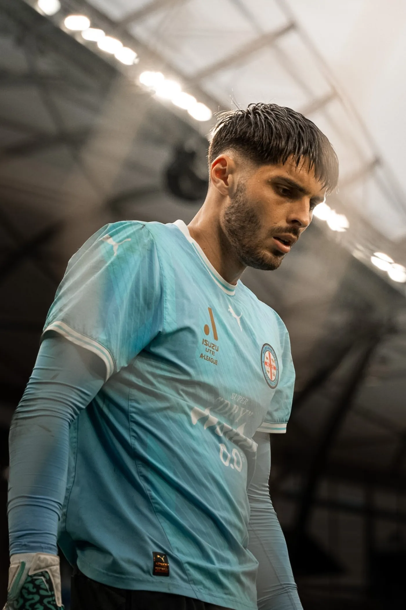 Melbourne City goalkeeper walking out of the tunnel